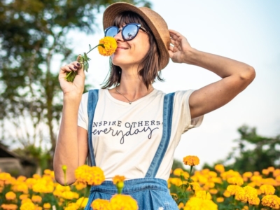 woman smelling flower